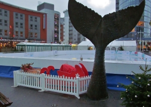 A tailfin sculpture amid some Christmas paraphenalia at Gunwharf Quays...